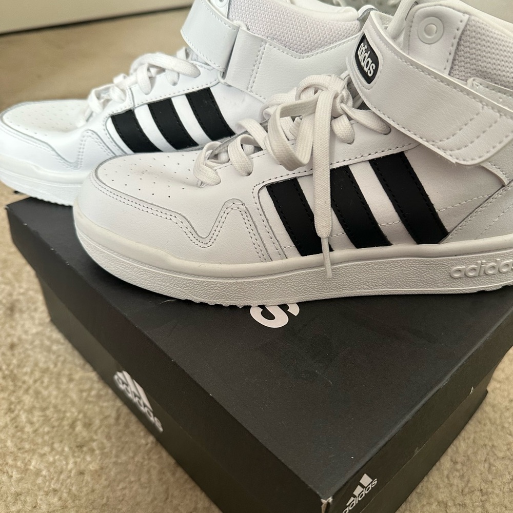 Worn once Adidas midtop Sneakers size 7.5. Lace and Velcro closure.